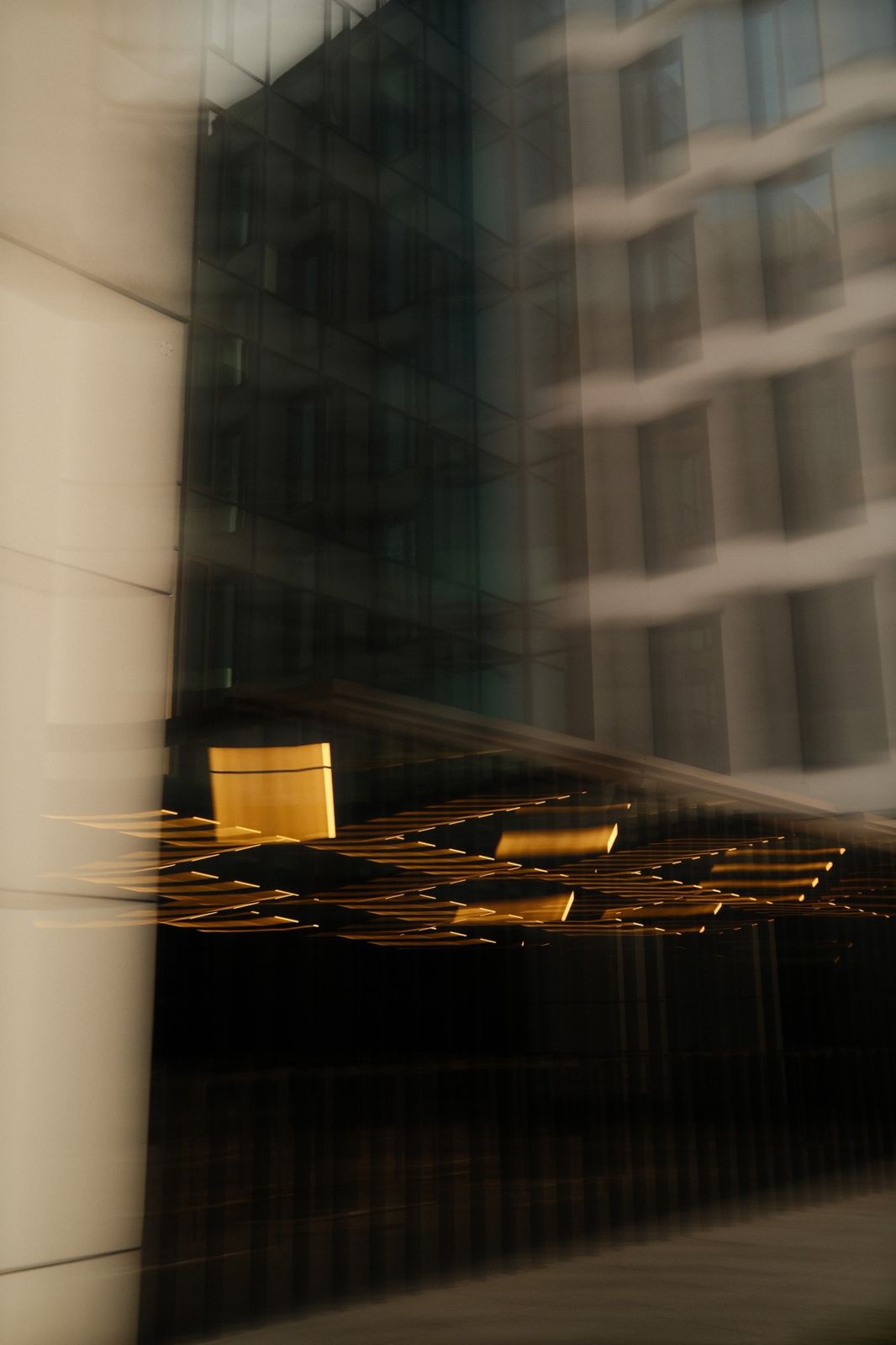 Office building at dusk with warm lights